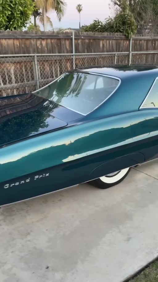Green Pontiac Grand Prix: finished in daylight
